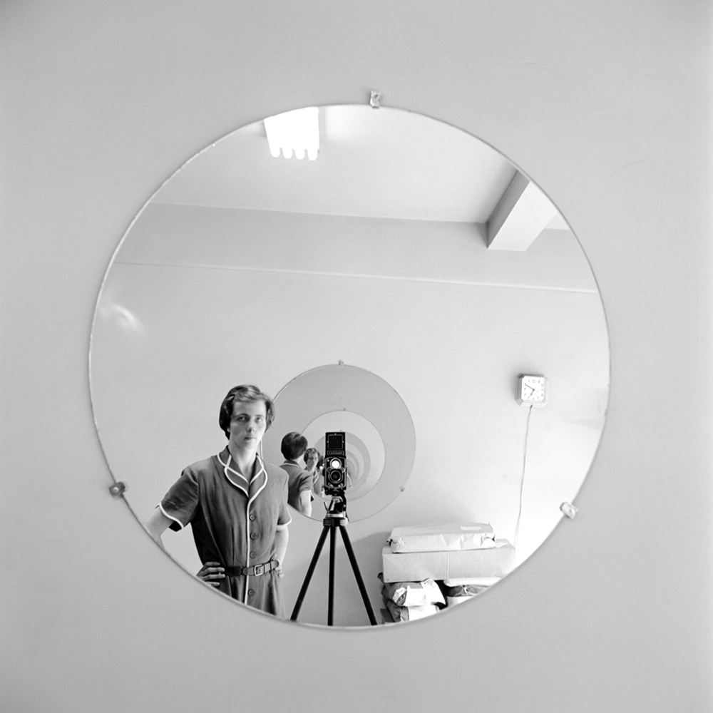Nanny or artist? The mysterious subject of the documentary "Finding Vivian Maier" turns the mirror on herself. Via Ravine Pictures.