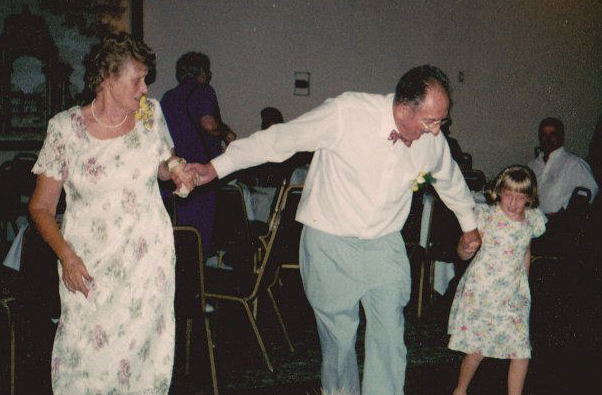 Long after her grandparents' 50th wedding anniversary in 2001, our intern Megan Ginise (age 8 in this photo) is still dancing with her grandfather, if only in memory.